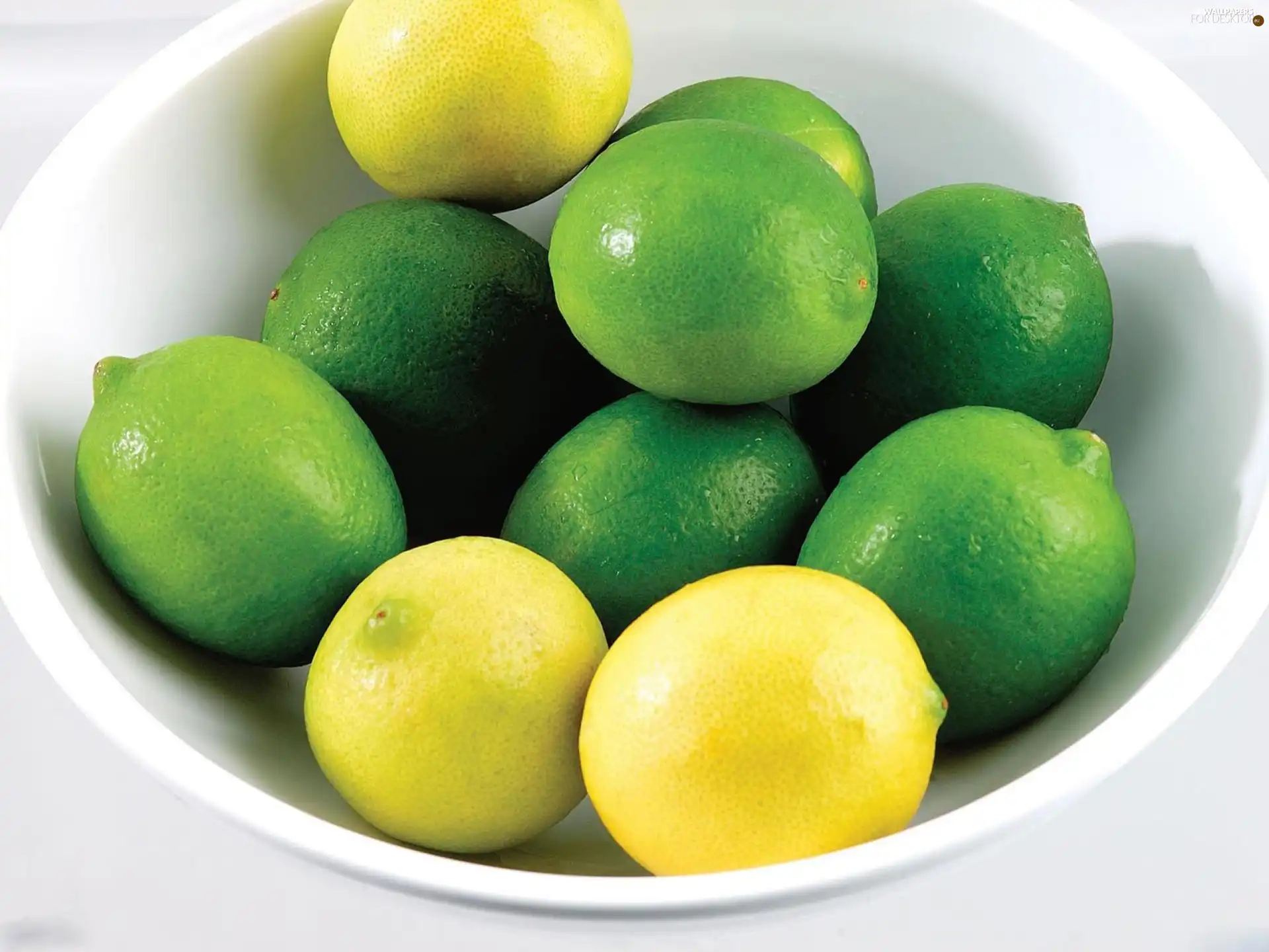 bowl, lemons, limes