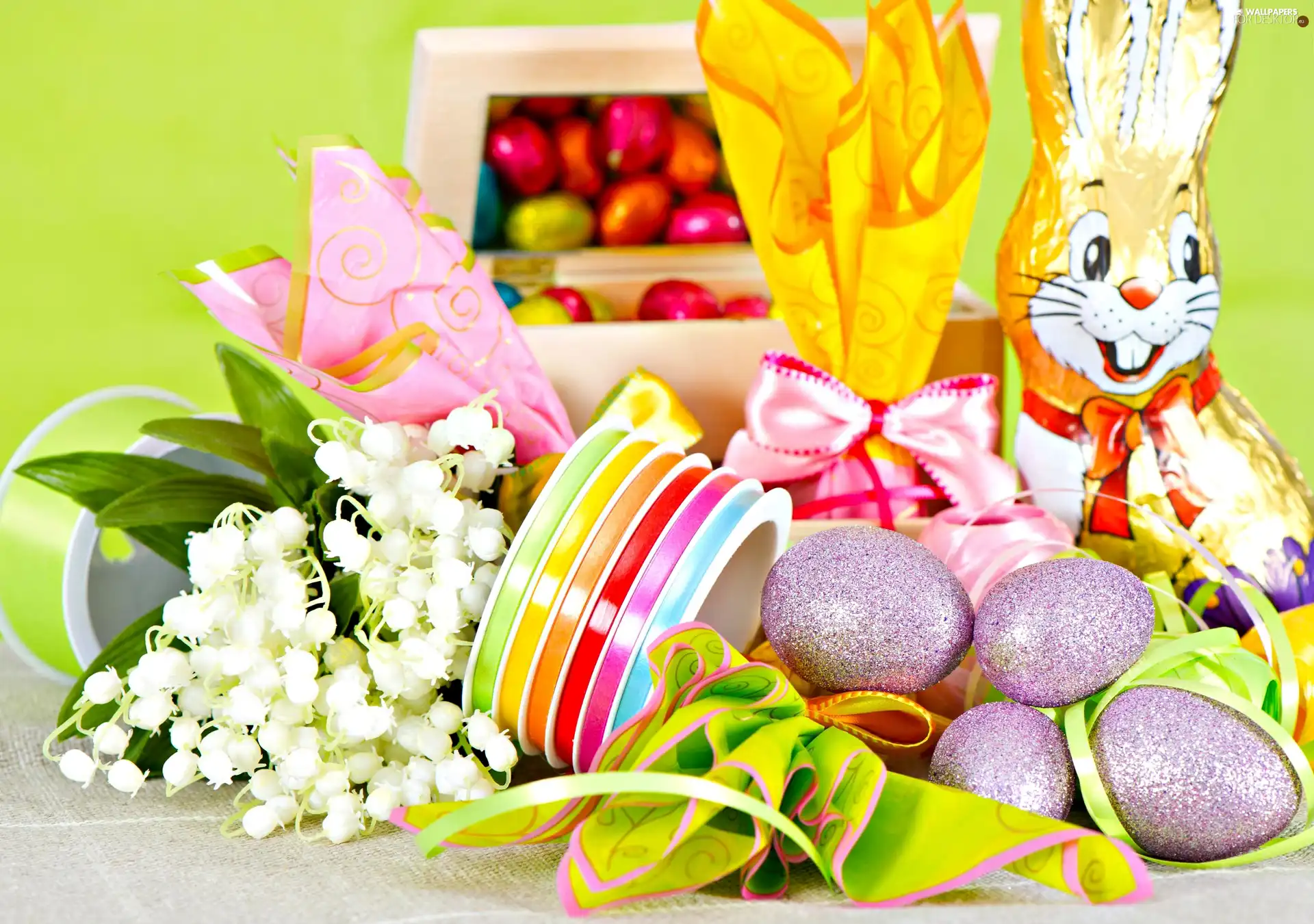 Ribbons, lilies, chocolate, eggs, rabbit