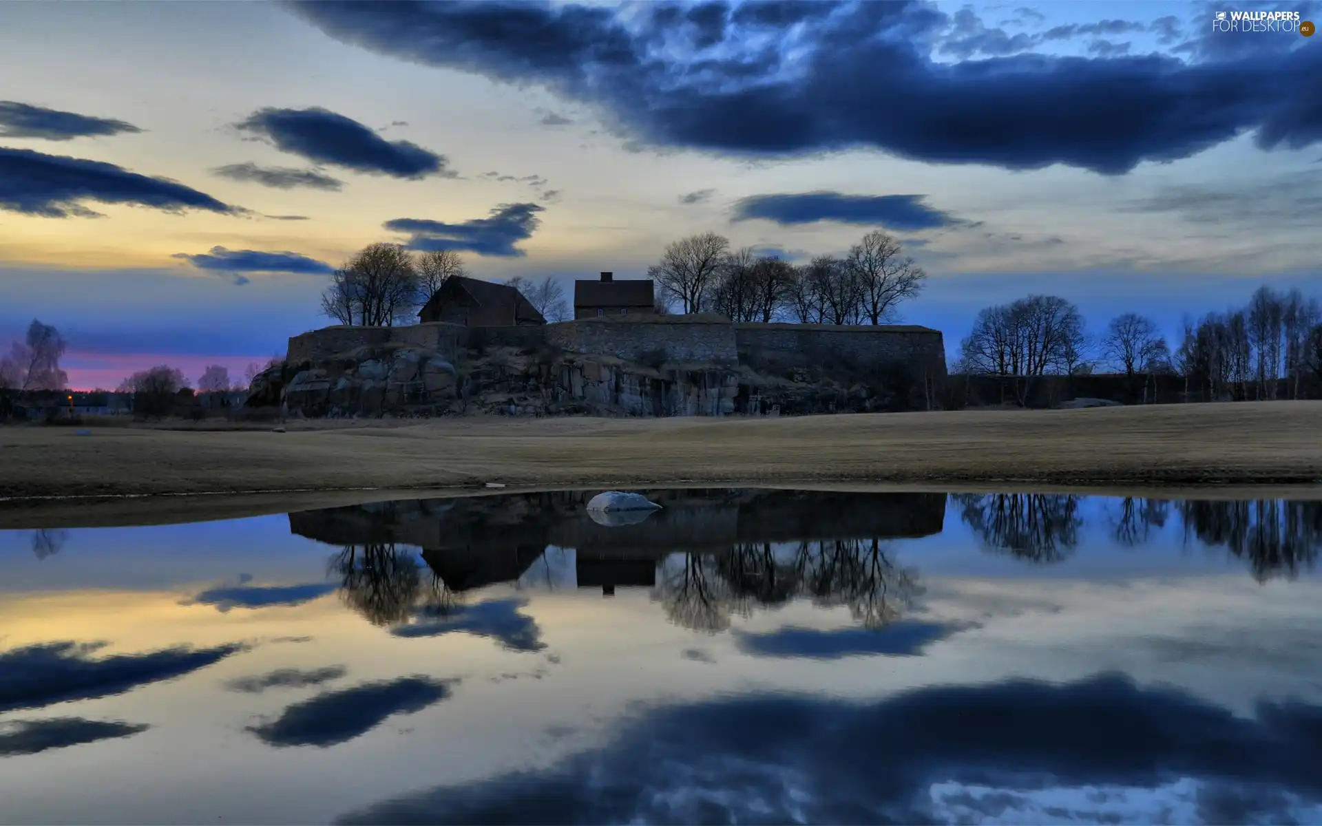 Sky, the walls, buildings, water