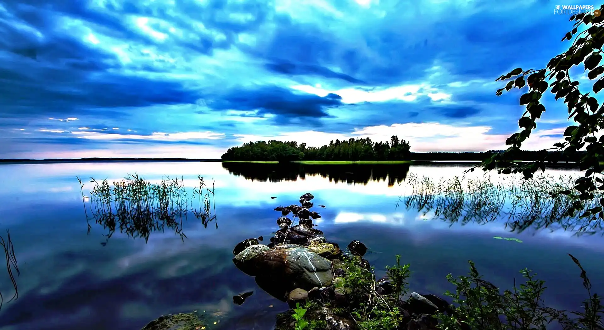 Stones, lake, clouds