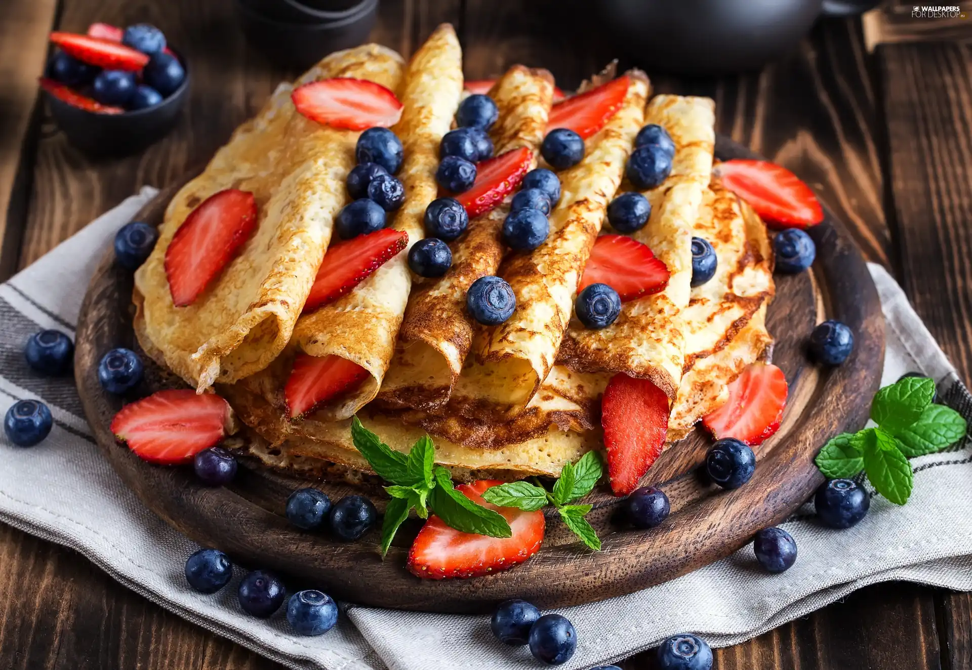 strawberries, pancakes, blueberries