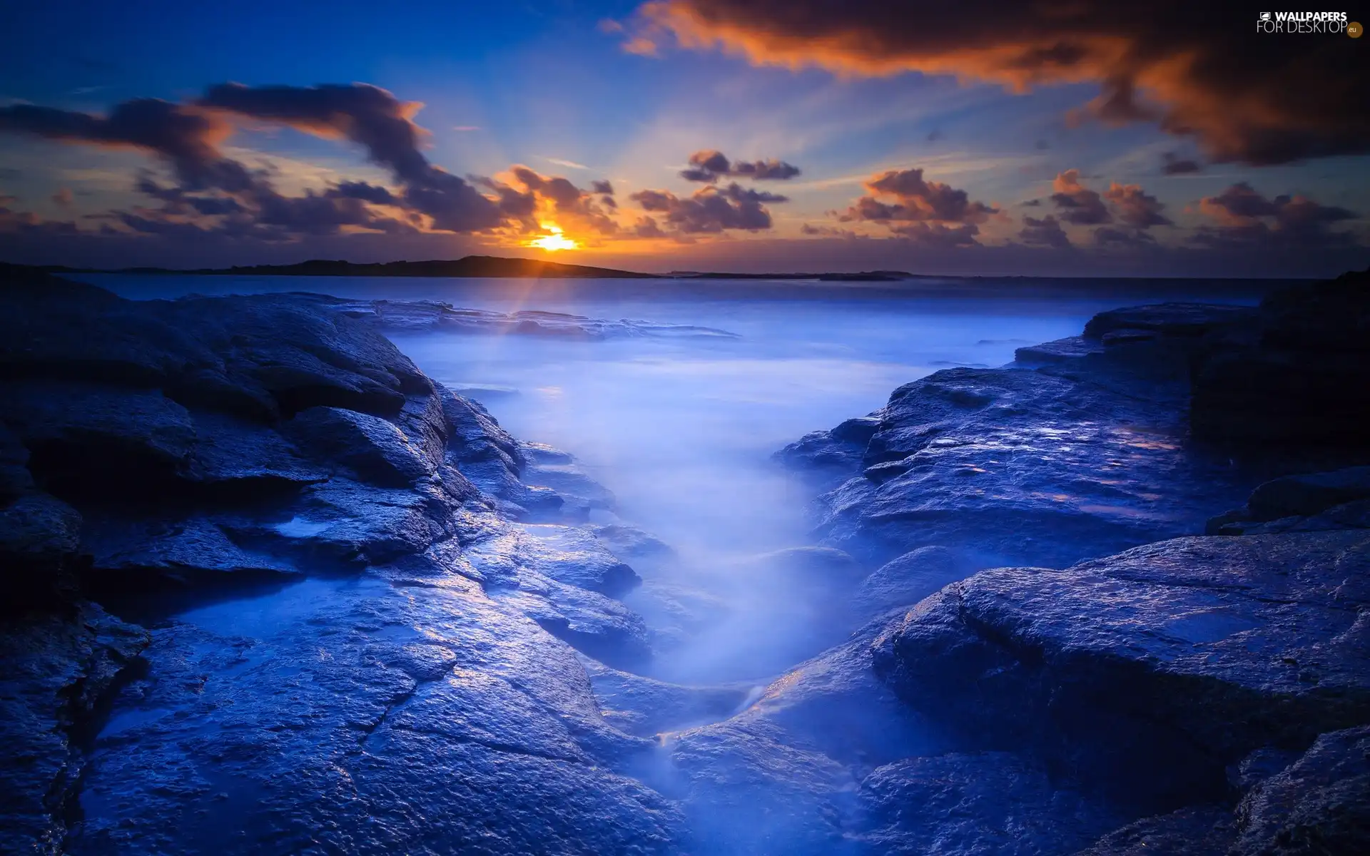 sun, rocks, sea