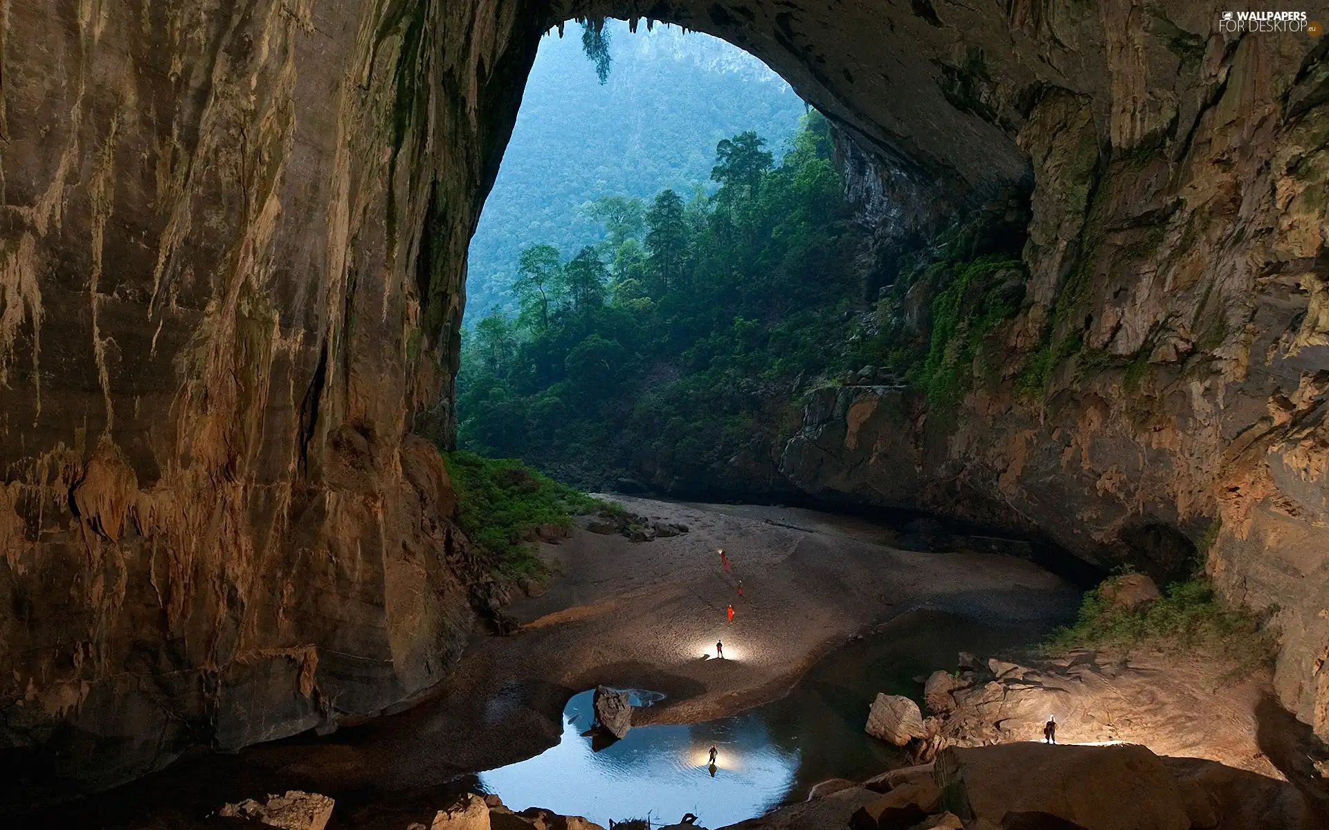 People, rocks, viewes, water, trees, cave