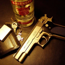 Gun, vodka, lighter, keys, wallet, Smirnoff