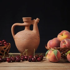 pitcher, cherries, peaches, basket