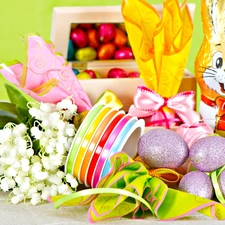 Ribbons, lilies, chocolate, eggs, rabbit