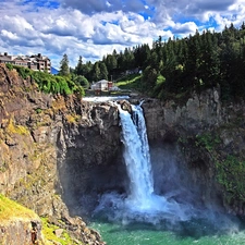 Hotel hall, waterfall, rocks