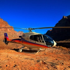 Helicopter, rocks