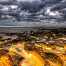 Stones, sea, clouds