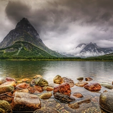 Stones, mountains, lake