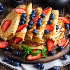 strawberries, pancakes, blueberries