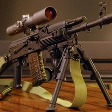 Table, telescope, AK-47, magazine, gun