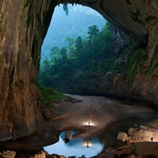 People, rocks, viewes, water, trees, cave